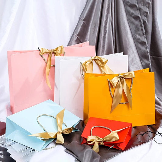 Wholesale Paper Gift Bags with Ribbon Bow Recycled Wedding Shopping Bags with Handles Clothing Cosmetic Jewelry Packaging Bags - SHOWLU FASHION STORE